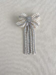 Extravagant Royal Pearl Ribbon Brooch - White Gold